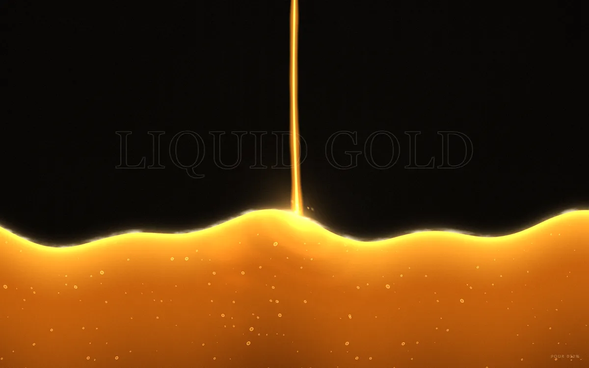 Golden liquid pouring and filling the screen